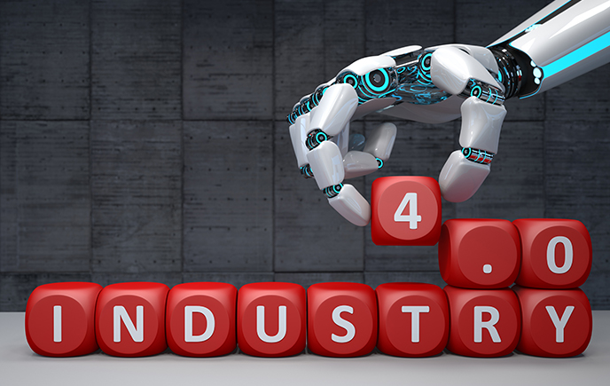 robot spelling out 'industry 4.0' in dice blocks